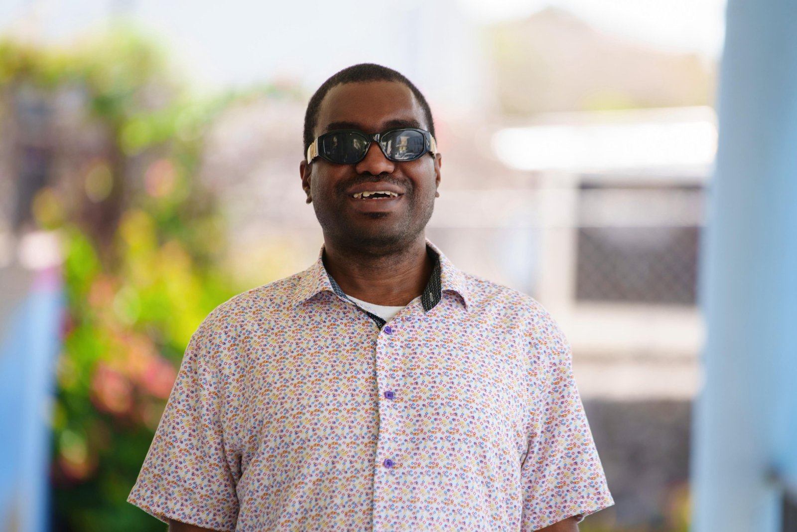 Kevin E. Cartwright, blind Bahamian educator and accessibility specialist, presented for professional blindness and assistive technology services.